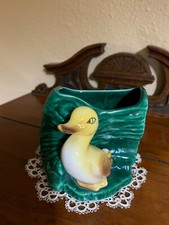 Vintage California Pottery Planter Duck in Front of a Green Log