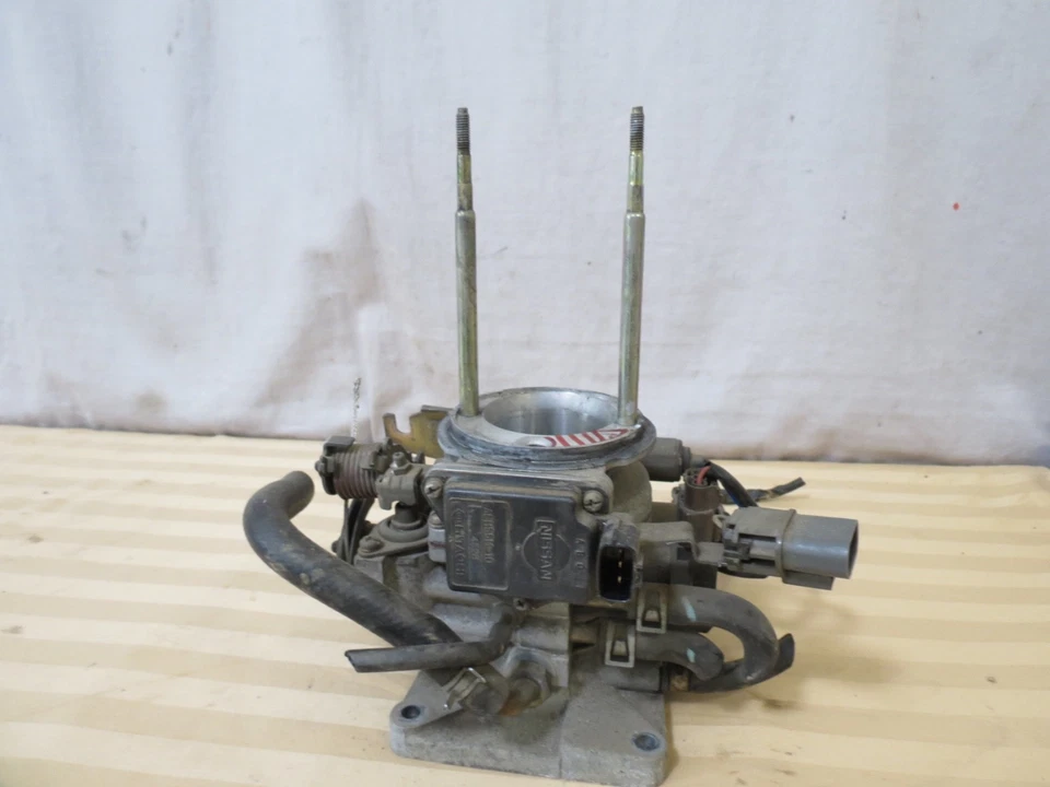 90 91 92 93 94 Nissan D21 camión de carrocería dura 2,4 L válvula de carrocería del acelerador de combustible AFH55M-10 Foto 2 de 4