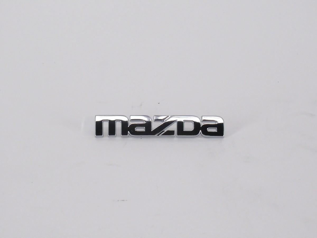 Mazda OEM 99-05 Miata Rear Bumper-emblem Badge Nameplate NC1051711