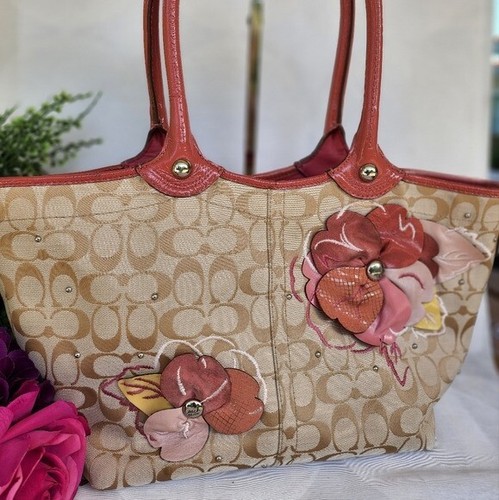 coach purse with leather flowers