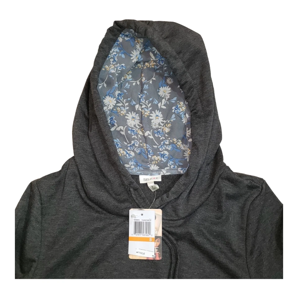 SUDADERA ELEGANTE NUEVA CON ETIQUETAS TALLA JUNIOR NIÑAS PEQUEÑAS, CAPUCHA Y LATERAL TIENE BONITA TELA Foto 2 de 4