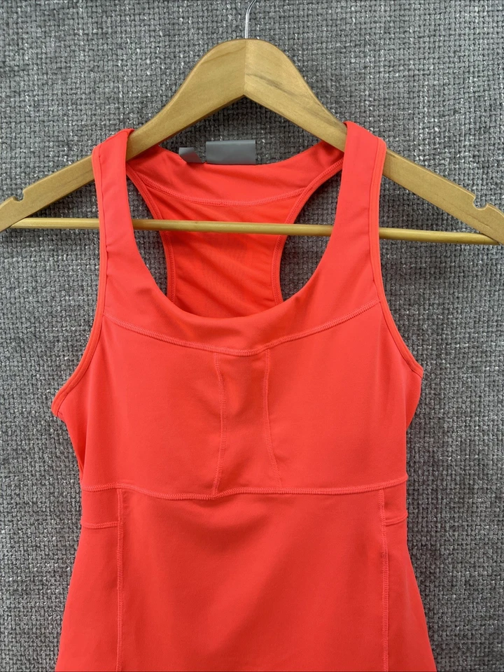Sujetador sin mangas Athleta para mujer pequeño espalda corredora incorporado demasiado coral bolsillos tenis talla S Foto 2 de 4