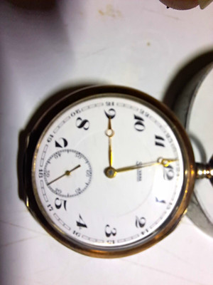 Mechanische Taschenuhr Silber  ,rotgold Rand, läuft 2bis 3 min,bleibt dann stehe