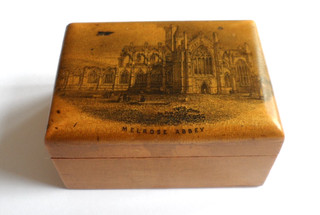 Antique Victorian Mauchline Ware trinket box with an image of Melrose Abbey.