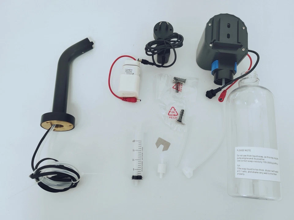 Dispensador automático de jabón espumante montado en la pared Foto 2 de 4