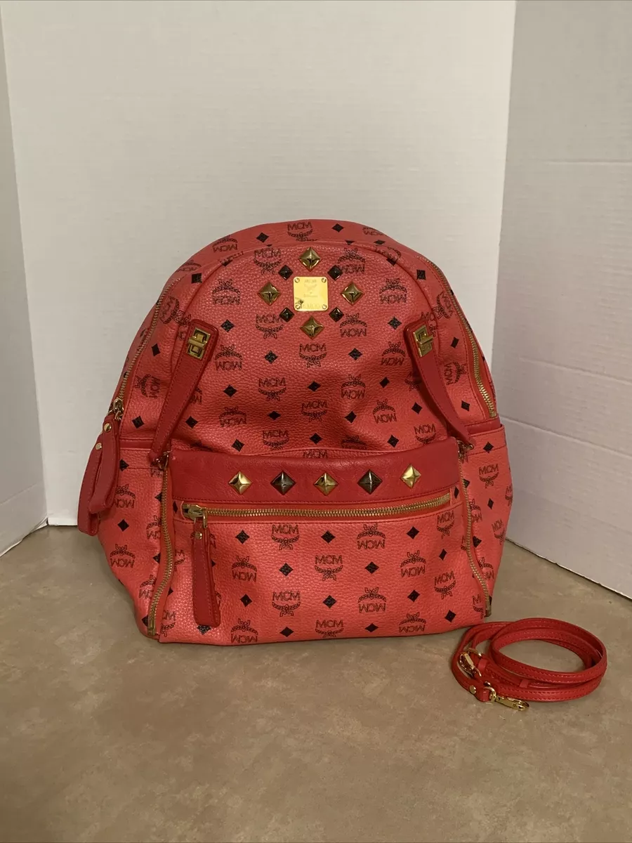 red mcm backpack