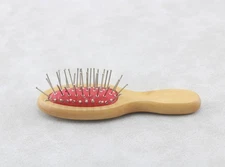 A wooden 4'' hairbrush fits 18'' American girl doll comb