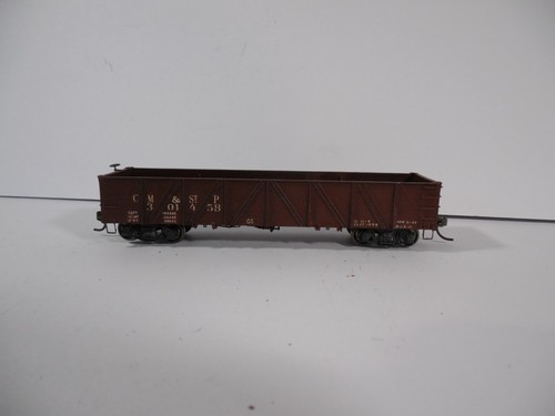 C.M. & St. P. GÓNDOLA #301458 ~ CAMIONES CON RESORTES, RUEDAS DE METAL Y KADEE ~ ESCALA HO | Condition: Used