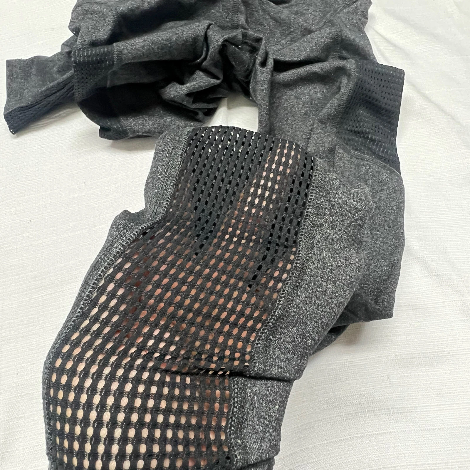 beyond-yoga vysokým pasem po celé délce černé síťované kapsy leggings