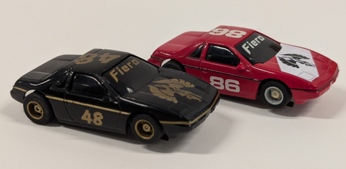 Vintage Tyco Fiero Challenge Black #48 & Red #86 HO Slot Cars