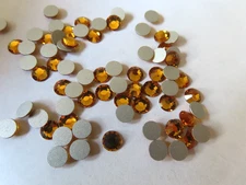 72 Preciosa VIVA 12 Flatbacks 20ss Topaz/foiled.