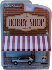 GreenLight Hobby Shop 1976 Volkswagen Golf Mkl GTI with Racecar Driver