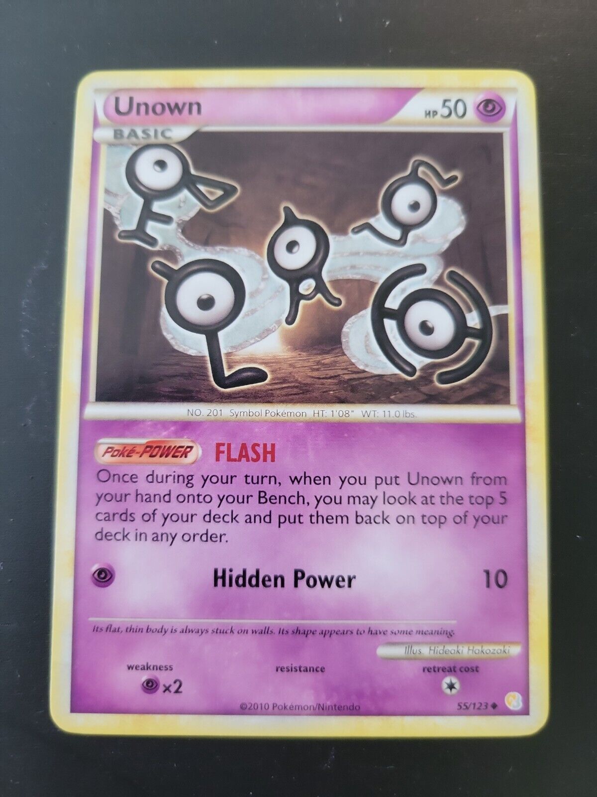 Unown (a) - 54/123 - Uncommon - Reverse Holo - Card Game Singles » Pokemon  Singles » Heart Gold Soul Silver - Game Cafe