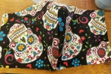 Reversible fancy decorated skull mask with filter pocket, nose wire, and elastic