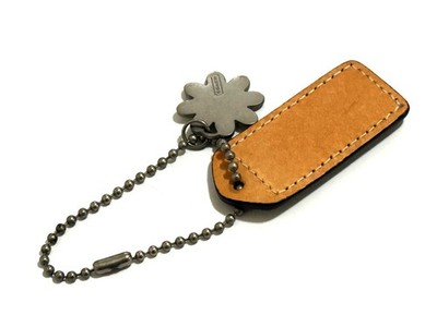 NICE VINTAGE COACH EMBOSSED GREEN LEATHER DAISY MOTIF BAG HANGTAG