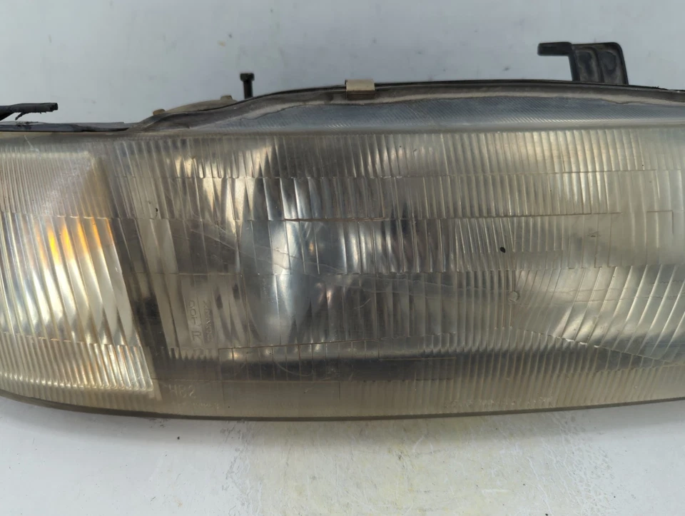 Faro luz izquierda conductor Suzuki Esteem 1995-1998 OEM YNN9O Foto 3 de 4