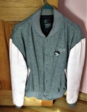 WOMAN'S "HARD ROCK CAFE" VARSITY JACKET. GRAY WITH PINK LEATHER SLEEVES. SIZE: M
