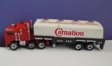 N gauge @ 160:1 scale Illuminated Carnation MilkTruck With Amber Over Cab Beacon