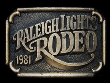 LC05152 VINTAGE 1981  RALEIGH LIGHTS RODEO  SOUVENIR CIGARETTE BELT BUCKLE