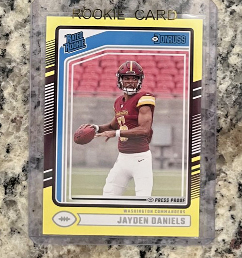 2024 Panini Donruss - Rated Rookie Jayden Daniels #389 Press Proof Yellow (RC)