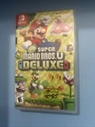 New Super Mario Bros. U Deluxe (Nintendo Switch, 2019) With Case & Manual