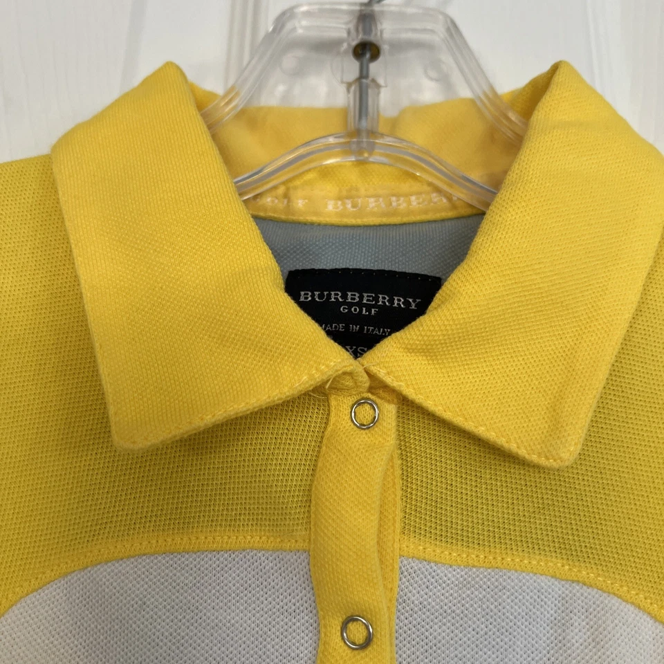 Camisa Burberry Golf Sin Mangas Halter Cuello Blanco y Amarillo XS ITALIA Foto 2 de 4
