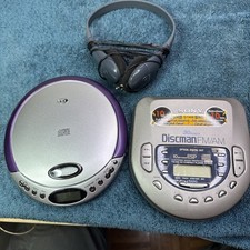 2 Discmans And 2 Walkmans With One Headphone. See Description 