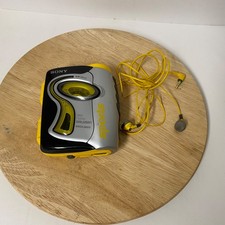 Sony Walkman WM-FS111 Sports AM/FM Cassette Mega Bass w/ Headphone Yellow Works!