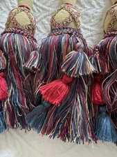 6 Blue/Red/Gold designer quality curtain tie backs. 28in total with 8" tassel.  