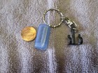 vintage mini skate board wheels storeage case keychain — photo 3