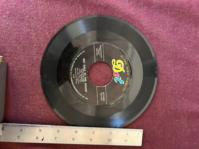 Dot record song Red sails in the sunset by Tab Hunter