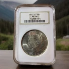 1922 D Denver Peace Silver Dollar Slabbed Coin MS 64 NGC
