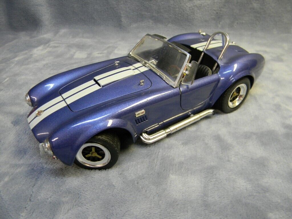 1/18 SCALE 1964 SHELBY COBRA 427 S/C ROADSTER LT. BLUE ROAD 1/18 SCALE 1964 SHELBY COBRA 427 S/C ROADSTER LT. BLUE ROAD