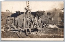 Primitive Homemade Oil Drilling Rig Men Working Occupational RPPC Photo Postcard