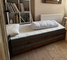 2x Ikea Vesteroy single mattresses With Stacking Pine Bed Frames