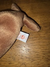 tusk beanie baby with tuck hand tag