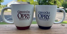 SET OF TWO GRAND OLE OPRY COFFEE CUPS MUGS TWO SIDED BLUE BROWN DRINK FUN SING !