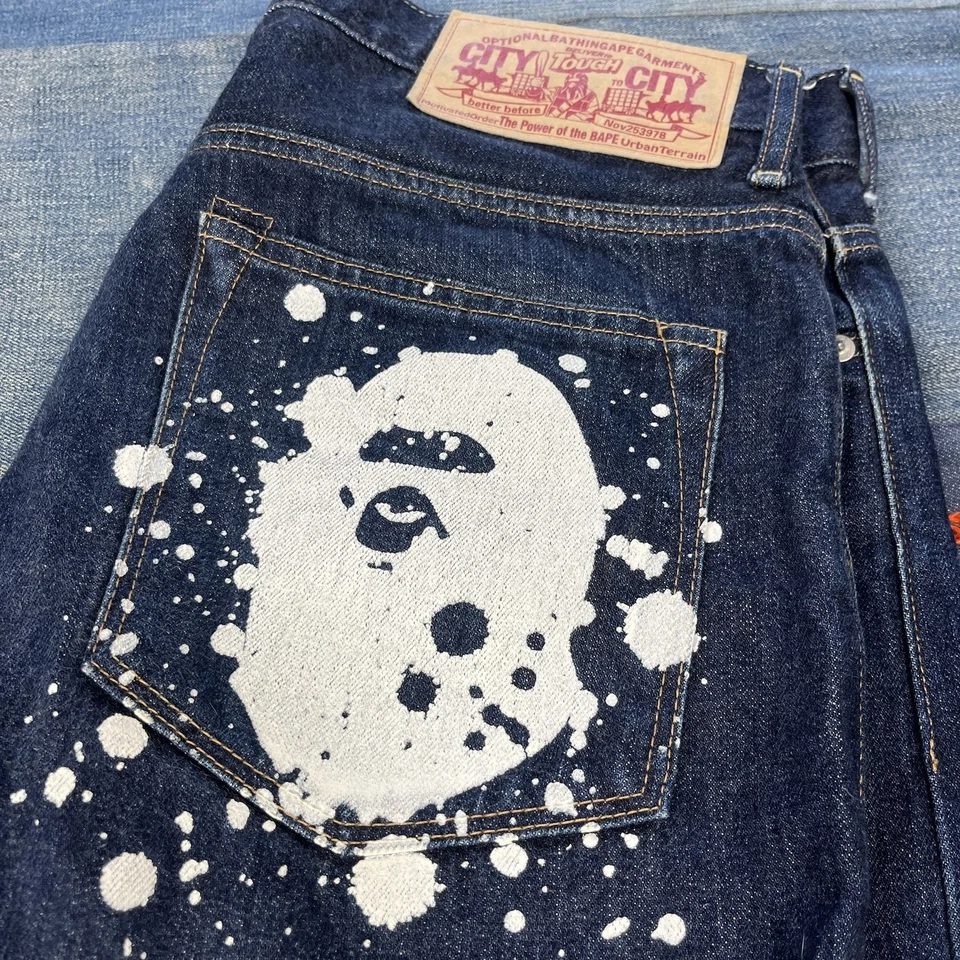 Pantalones de mezclilla OG Bape con logotipo salpicaduras ribete talla 34 raros de colección auténticos Y2K OG Foto 2 de 4