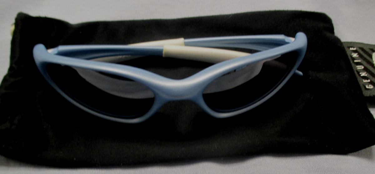 OAKLEY MINUTE 1.0 GEN 2 POWDER BLUE FRAME W BLACK IRIDIUM 