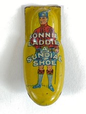 Vintage Bonnie Laddie Shoes "A Sundial Shoe" Litho Tin Clicker