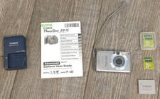 Canon PowerShot SD600 Digital Camera Bundle Battery, Charger, SD Cards, Manual
