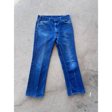 Vintage 1970's distressed Orange tab Levi "Action Jeans" size 35x30