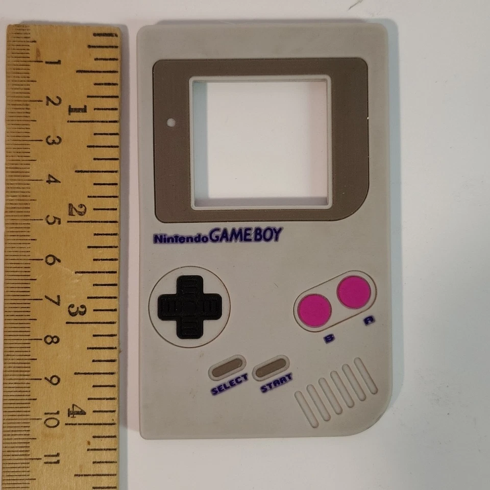 Mordedor de bebé Nintendo GameBoy gris silicona edades 3+ mos chupete calma a los vagabundos Foto 3 de 4