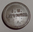 Park River North Dakota ND trade token J. M. Laybourne 5¢ brass — photo 1