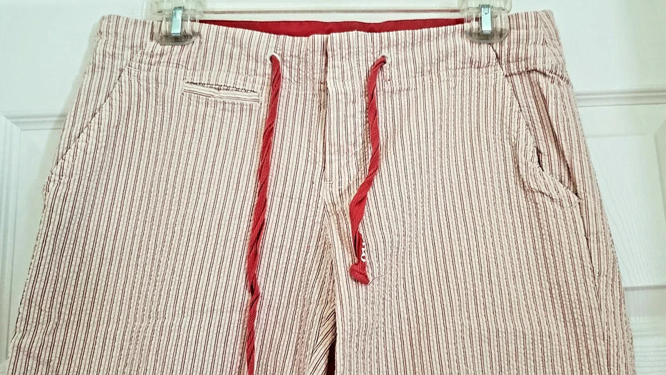  PANTALONES CORTOS A RAYAS ELÁSTICOS HASTA LA RODILLA ADIVINAR DE SEGUNDA MANO TALLA 28 Foto 2 de 4