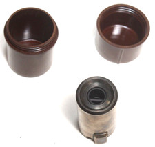 CANON VINTAGE FILM CARTRIDGE AND BAKELITE STORAGE CASE. RARE AND COLLECTIBLE.