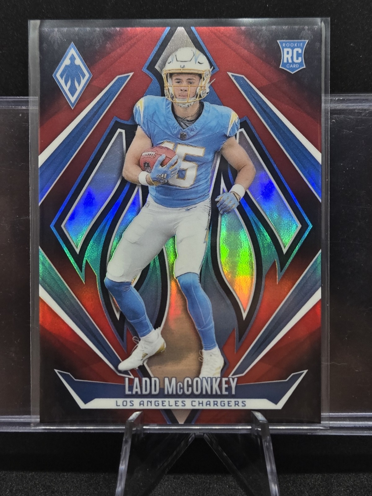 2024 Panini Phoenix - Rookies Ladd McConkey #216 Red Fade /299 (RC)