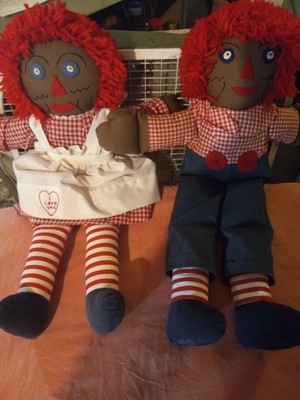 black raggedy ann doll with red hair