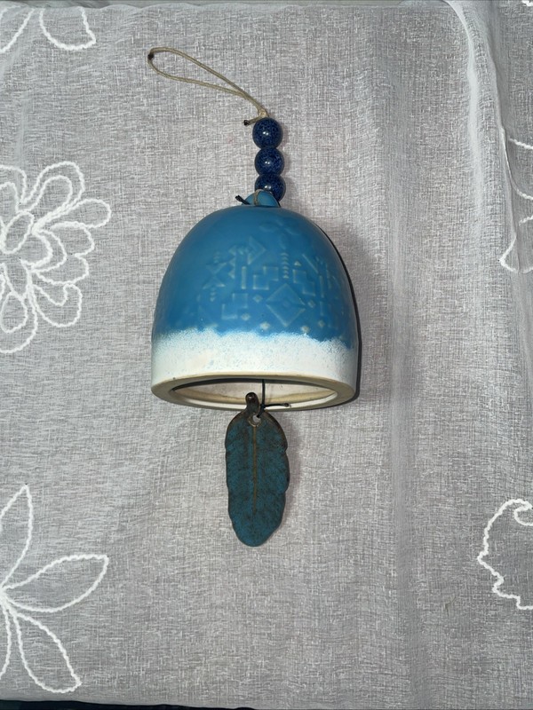 Wind Chime-Artisan made/Southwest pattern on bell w/ feather clapper.