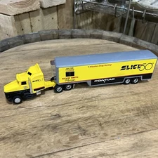 1/64 SCALE ERTL DIECAST TRANSPORTER RICKIE SMTH SLICK 50 LOT #184